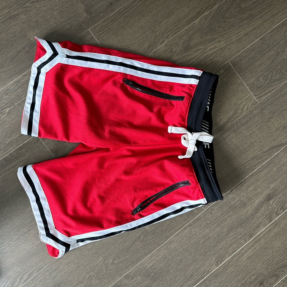 Red white and black basketball/boxing style shorts